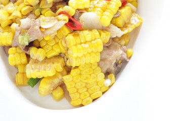 Chinese food, summer sweet corn and pork stir fried with Chili pepper