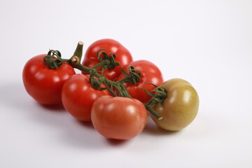 Fresh Bunch Tomatoes In White Background