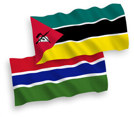 Flags of Republic of Mozambique and Republic of Gambia on a white background