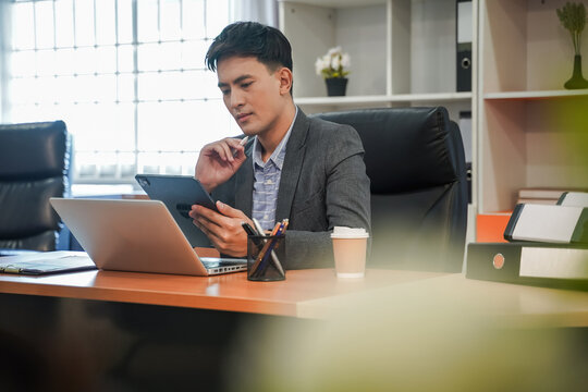 Businessman Thinking In Tablet Office Caucasian Looking Mobile On Screen Business Colleagues