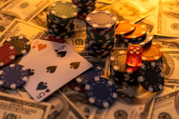 Poker cards royal flush, cash money dollar bills. Gambling, casino chips, dices. Casino tokens, gaming chips, checks, or cheques on green table in casino club