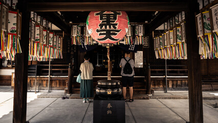 People pray for buddha in the japan temple