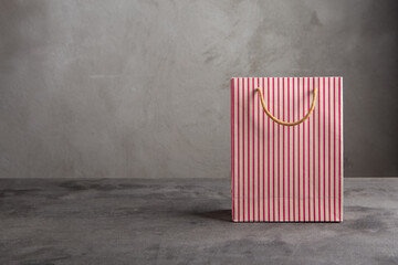 Blank paper carrier bag with handles for shopping - disposable bag, recycling concept