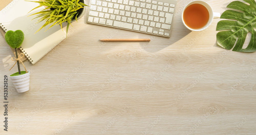 Fototapete Flat lay of top view desk work table with Coffee computer notebook and pencil work space in minimal wood warm tone concept includes copyspace for add text or graphic