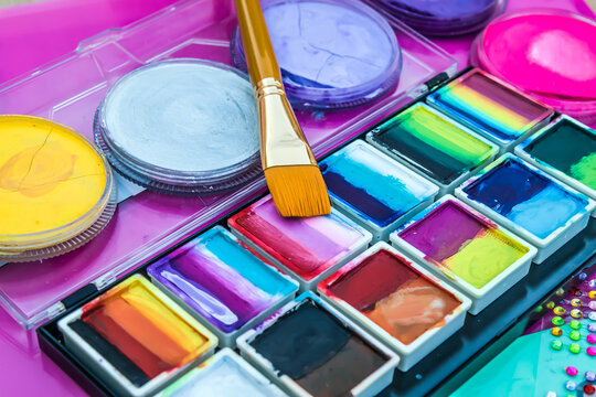Brush for drawing. Face painting. Painting of the face and body for children. Color palette.