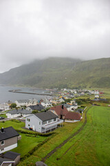 Fototapeta premium Panorama view of the landscape near Alnes fyr in Alnes on Godøya island in Møre og Romsdal in Norway (Norwegen, Norge or Noreg)