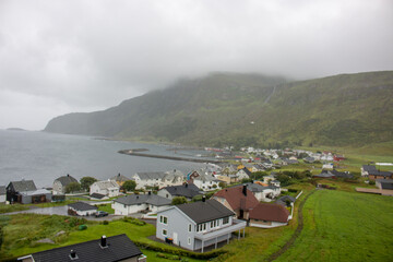 Fototapeta na wymiar Panorama view of the landscape near Alnes fyr in Alnes on Godøya island in Møre og Romsdal in Norway (Norwegen, Norge or Noreg)