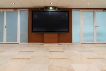 Large screen in the business lobby of a hotel or office