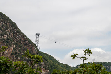 the funicular moves between the mountains at a height in the mountains of Armenia