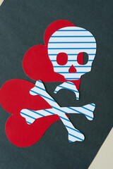 two hearts and skull and crossbones with stripes