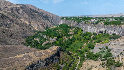 panoramic view of a mountain landscape with a gorge against the sky in Armenia taken from a drone