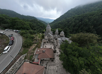 panoramic view of a mountain landscape with ancient stone buildings in Armenia taken from a drone