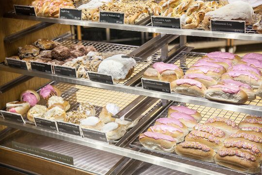 Buns and sweet breads for sale at a bakery