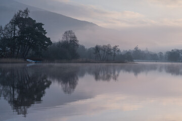 Beautiful misty morning on Loch Ard in Scotland