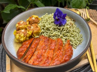 Green tea noodle with roast chicken and dumplings