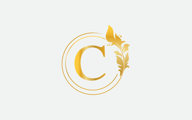 Golden leaf and circle logo design vector. Golden beauty and business symbol and alphabets vector design C