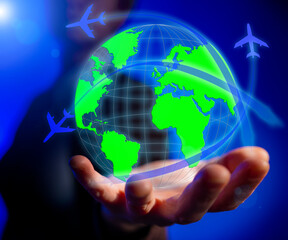 Air travel concept, virtual globe planet earth with flying planes on female hand