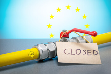  Gas pipeline with closed valve and symbol of the European Union. Ban supply og gas, closed tap.