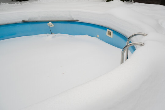 Swimming Pool In Winter In Snow Outdoors.