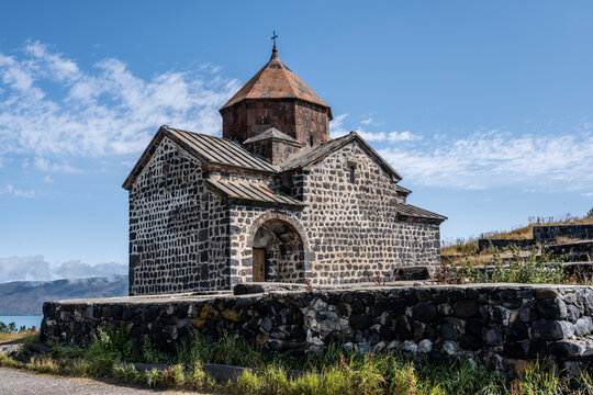 landscape with views of ancient stone buildings and temples on a summer day near Lake Sevan in Armenia