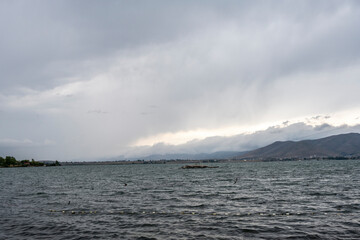 landscape with views of Lake Sevan and mountains and clouds on a summer day in Armenia