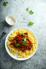 Pasta with spicy meat ragout and chili