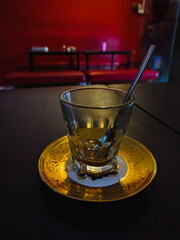 close-up of empty coffee cup on table inside cafe