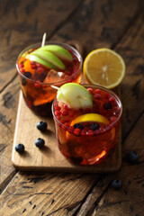 Traditional homemade sangria with fruits and berries