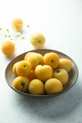 Fresh ripe apricots in a bowl