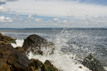 water splashes over rocks