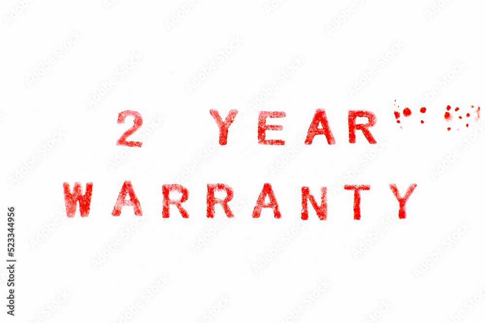 Sticker Red color ink rubber stamp in 2 word year warranty on white paper background