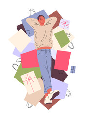 Man lies contentedly on shopping bags