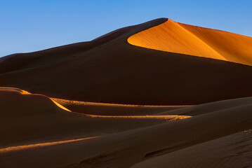 The dunes of Erg Chegaga at sunset. Erg Chegaga (or Chigaga) is one of two major Saharan ergs of the Sahara in Morocco. It is the largest and wildest of Morocco.