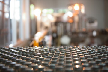 Conveyor belt, industrial production line, juice in bottles on beverage plant , selective focus.