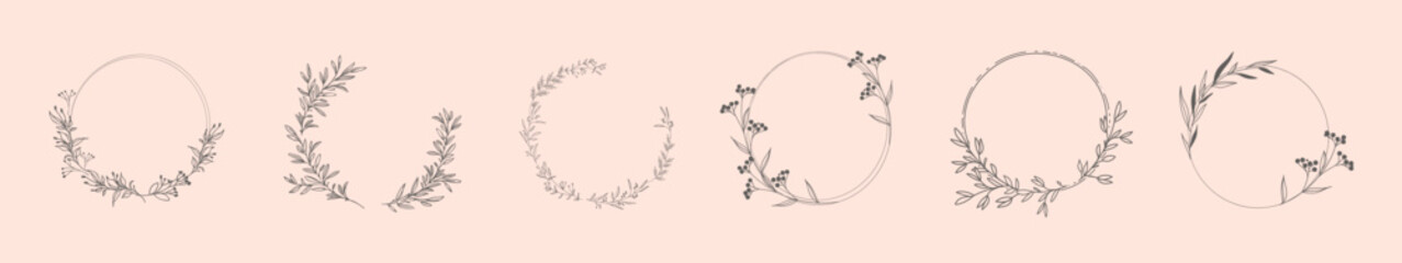 Decorative round floral frames hand drawn. Vintage laurel wreath © 4zevar