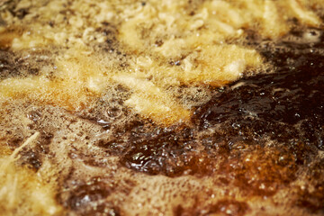 Obraz na płótnie Canvas food being fried in oil