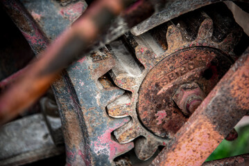 Old rusty gears on abandon steam machine
