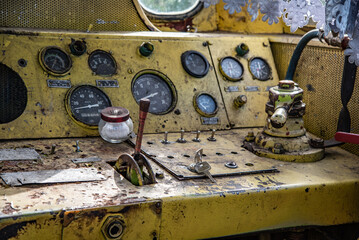 Obraz na płótnie Canvas Control room in old vintage train, abandon and rusty