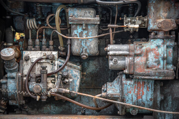 Fototapeta na wymiar Old diesel engine on agricultural machine