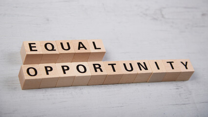 wooden blocks building the word equal opportunity