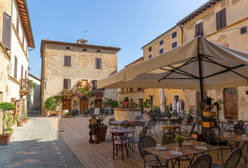 Cozy town square with restaurant in Pienza