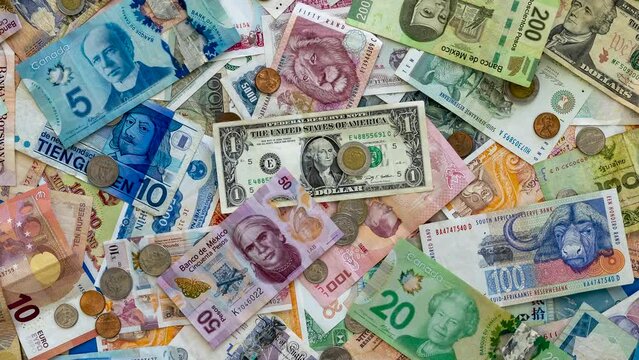 A Rotating  Background of a Variety of Currencies
