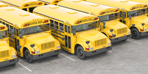 Yellow school bus in a row on a parking.