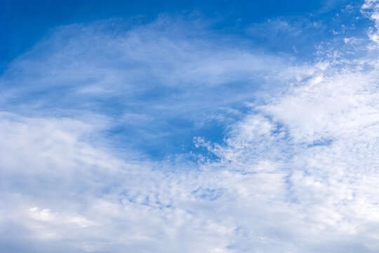Cirrostratus clouds against bright blue sky, nice sky shot to use as background image. 