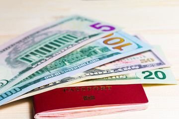 Passport with banknotes of dollars