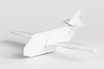 Plane origami on white background