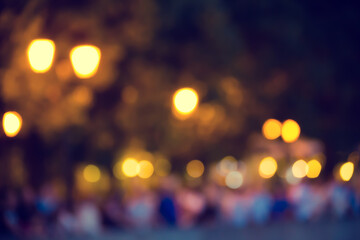 Blurred abstract urban background with street lights in bokeh shape