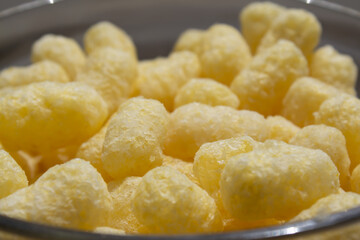 Sweet tasty corn sticks in sunlight.