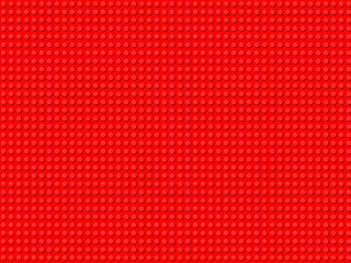 Red plastic plate with pimply circles.