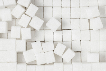 White sugar cubes background. Top view.